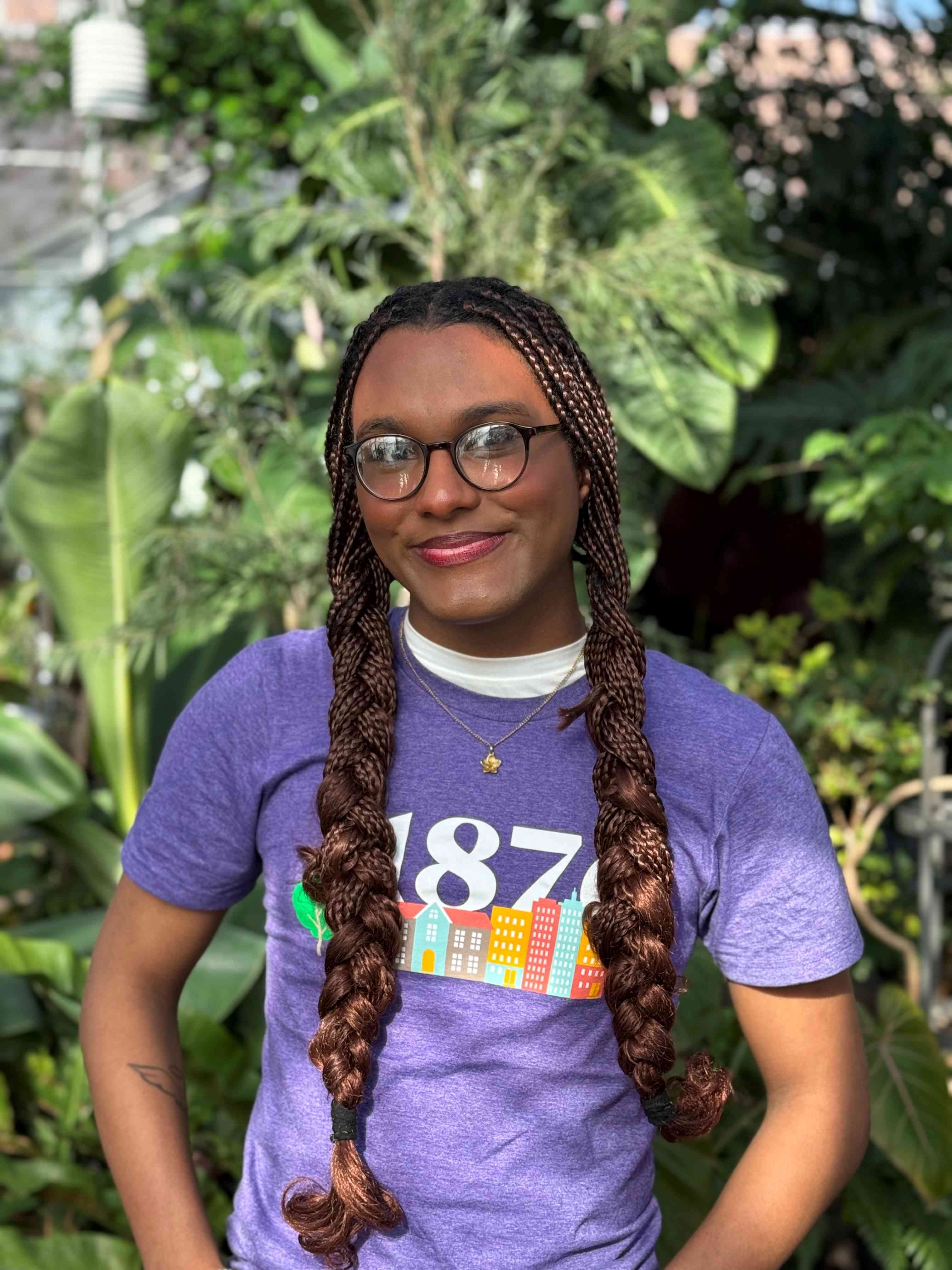 Dyshaun wearing purple shirt