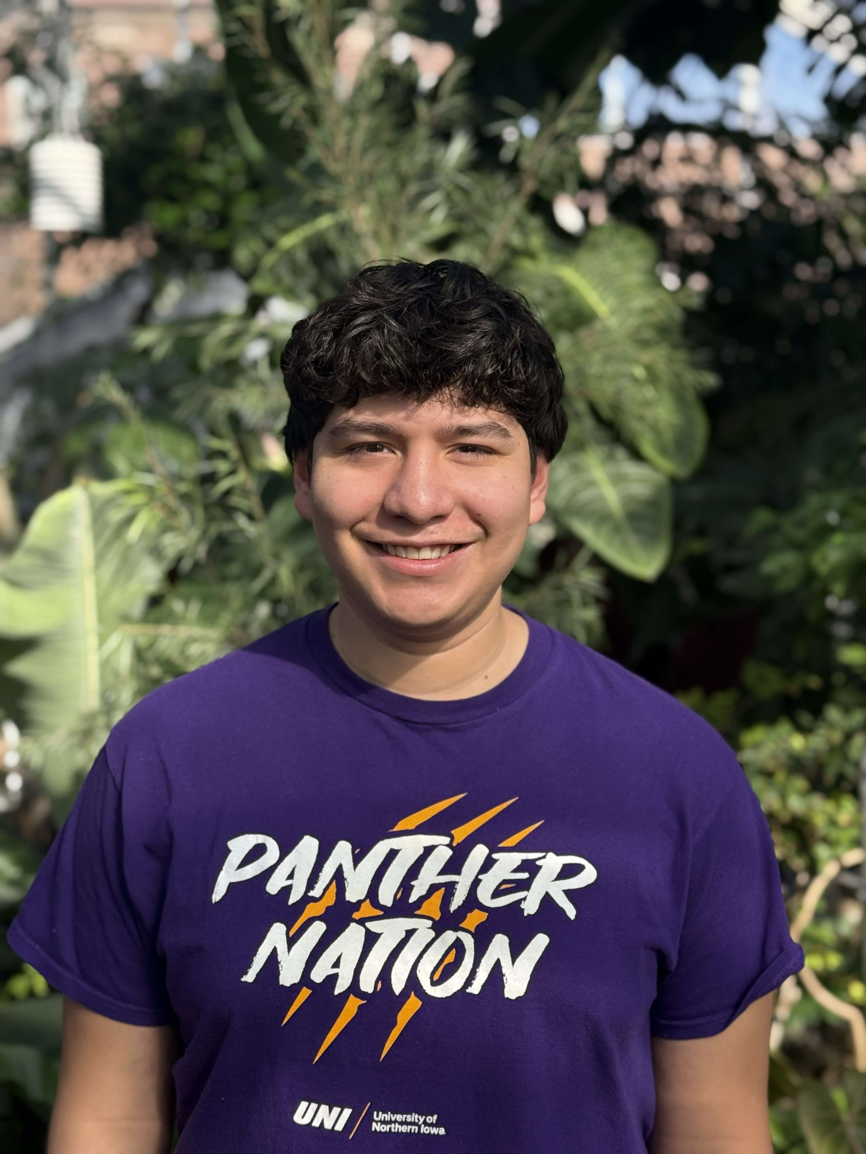 Oscar wearing purple shirt