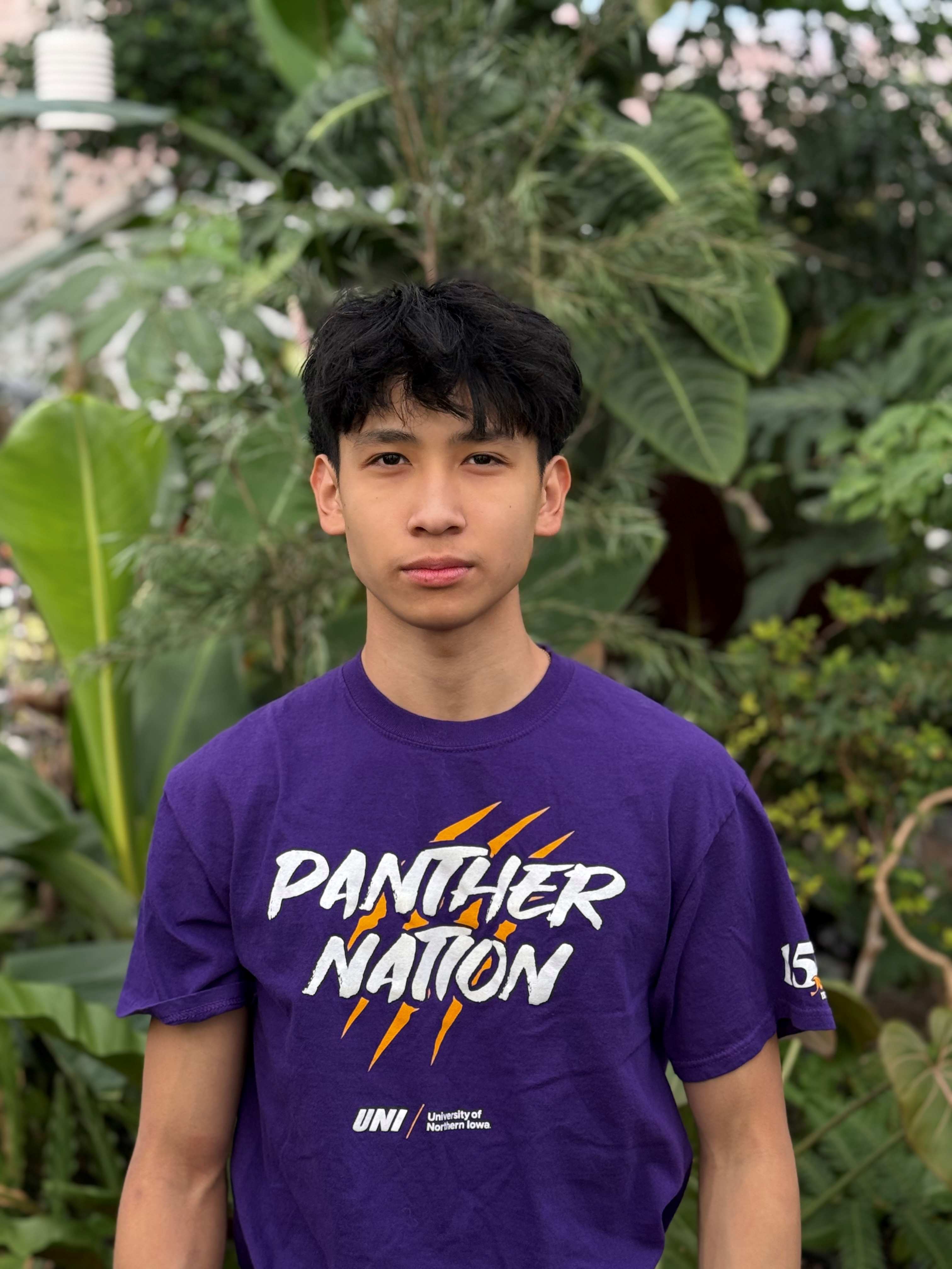 Randy wearing purple shirt