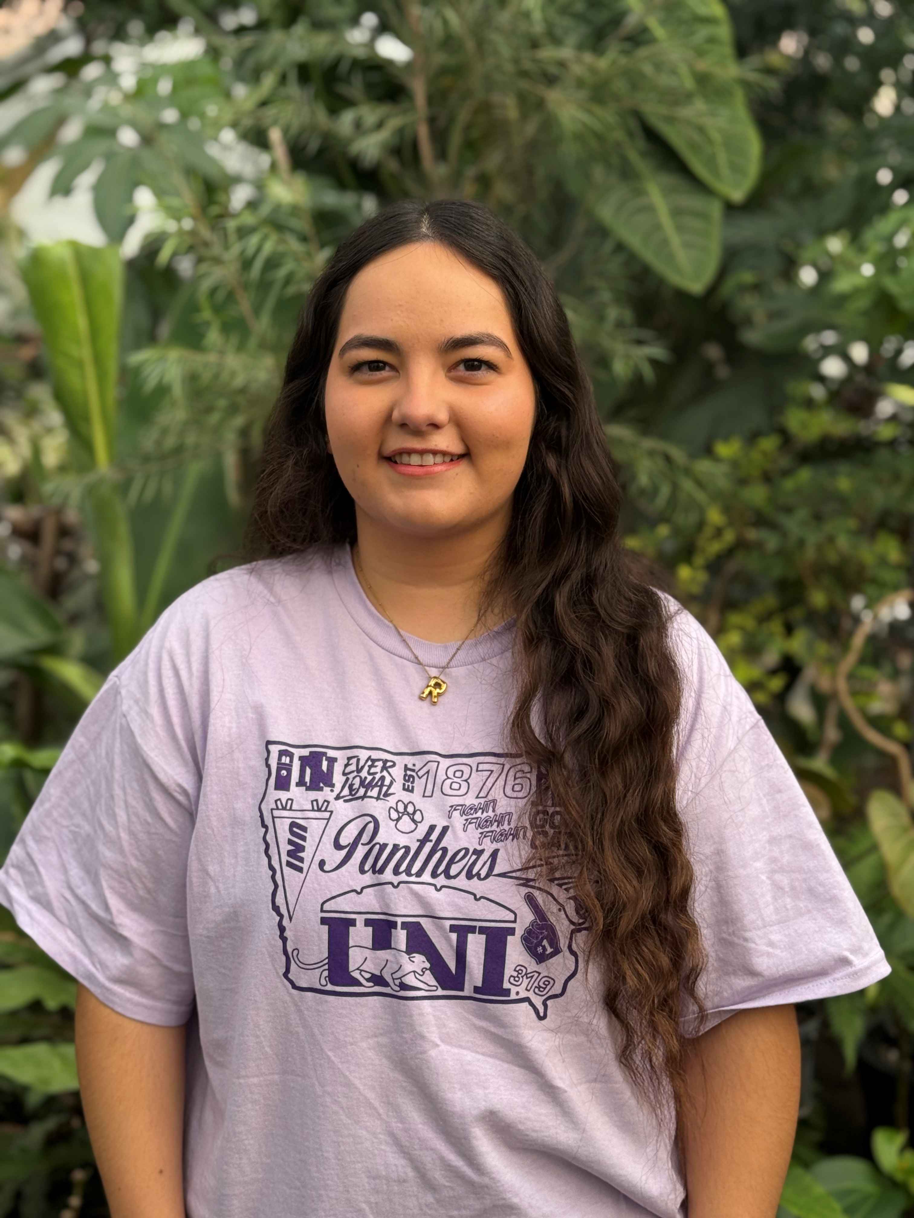 Roxanna wearing light purple shirt