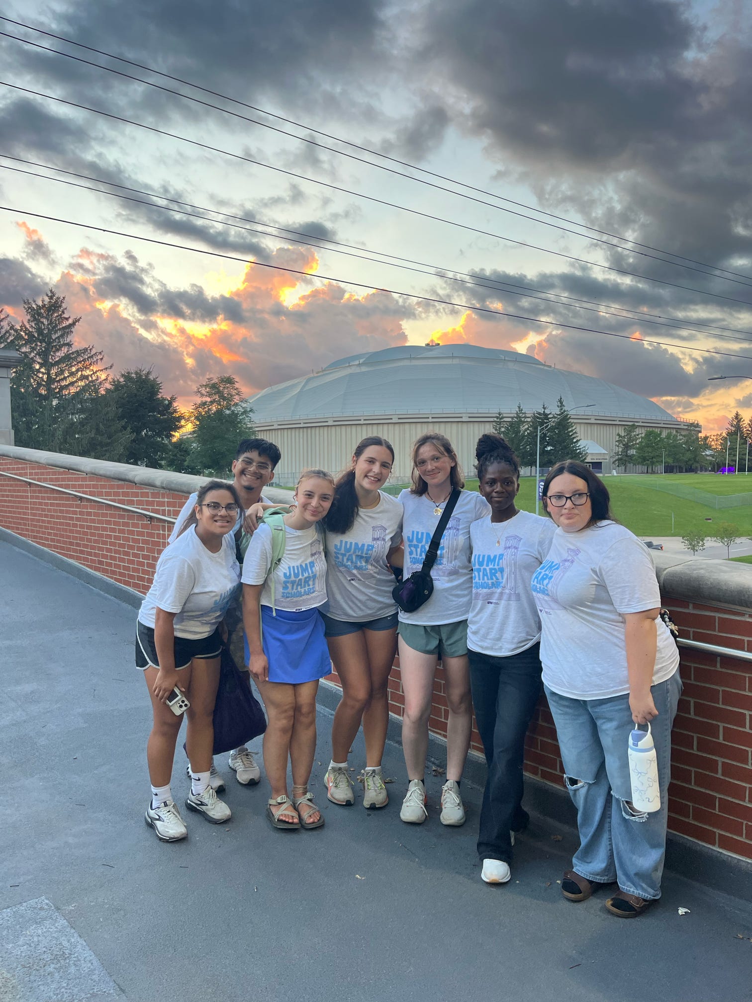 Group of students standing in front of the UNI Dome