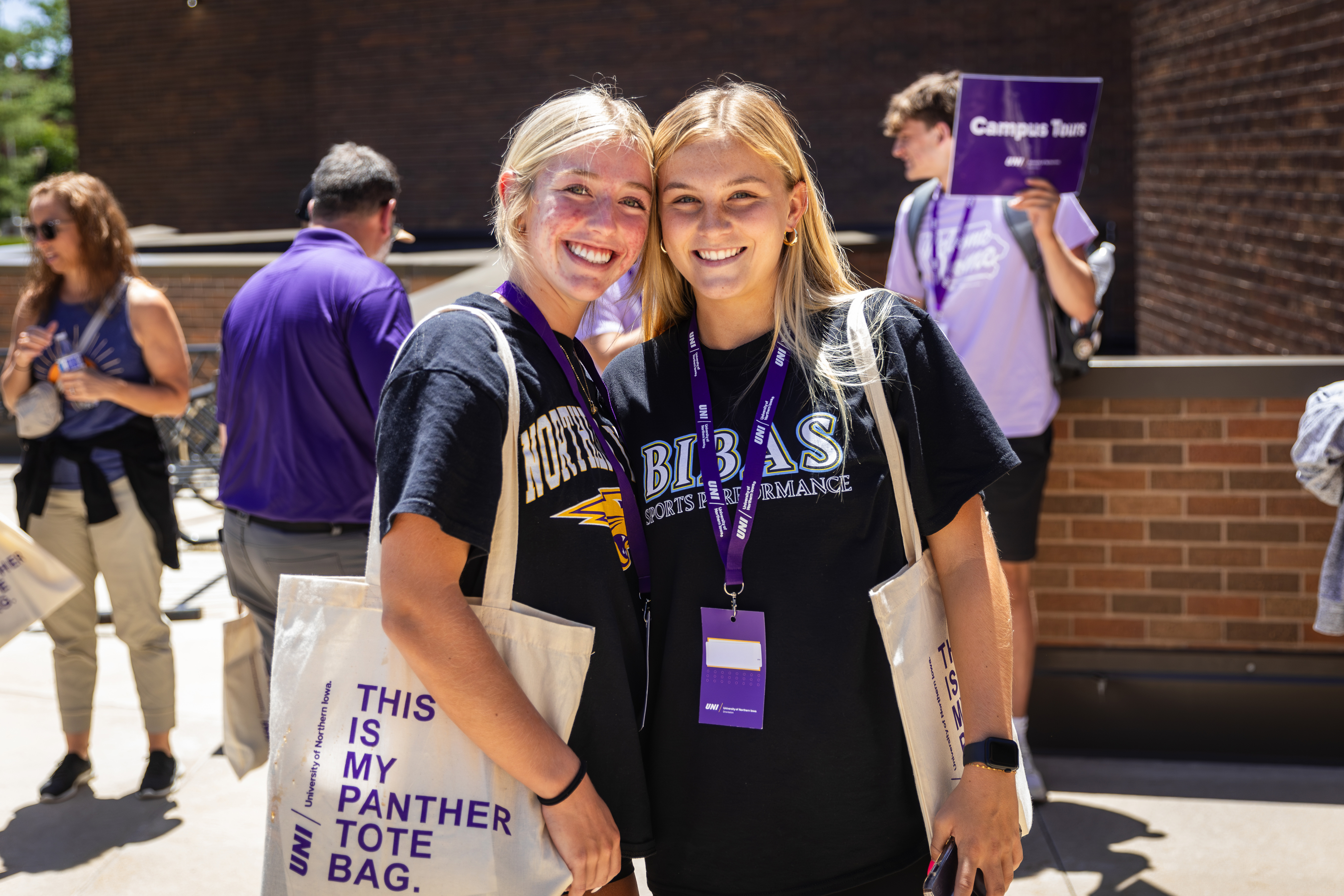 Two young women smiling