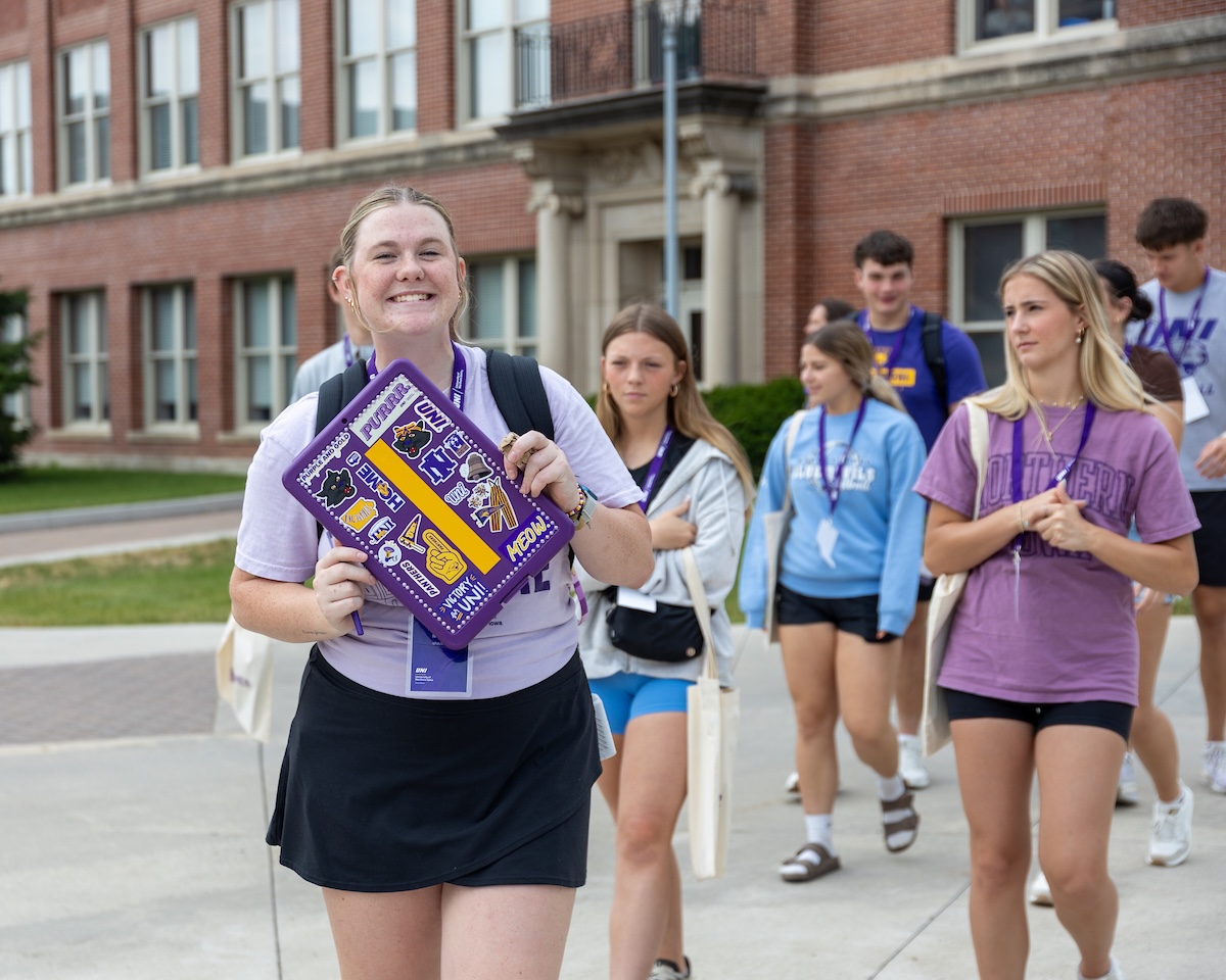 Students in a group on campus for Orientation.