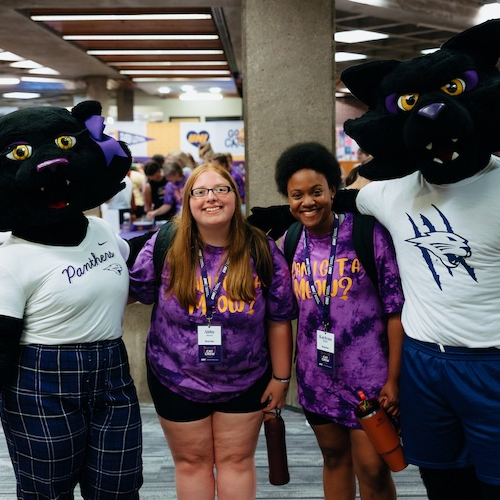 Students posing with TC and TK during Welcome Week.