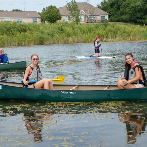 Students canoeing. 